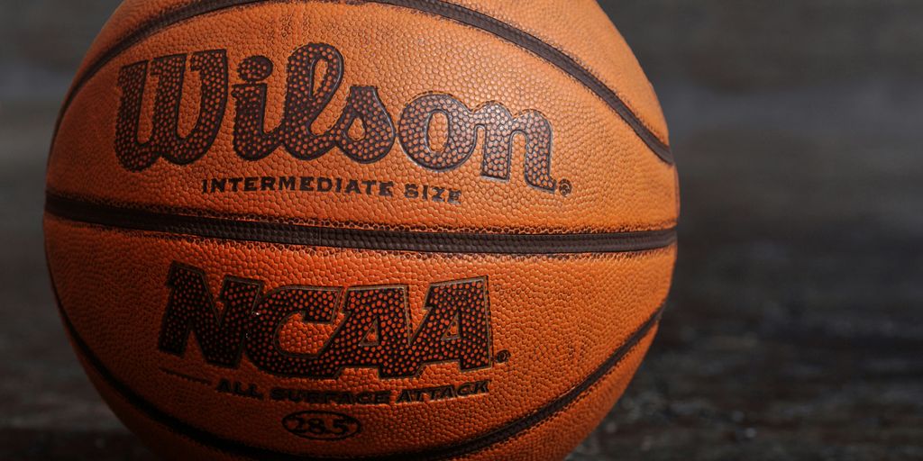 Wilson NCAA basketball on black board